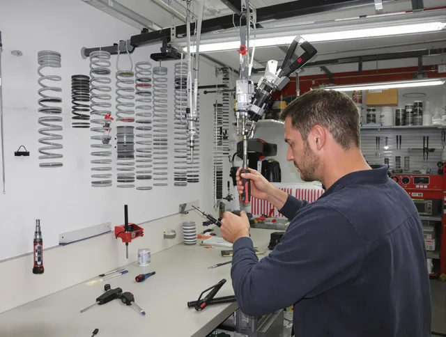 Wilmington Garage Door Repair safety certified technician performing precision spring replacement in Wilmington