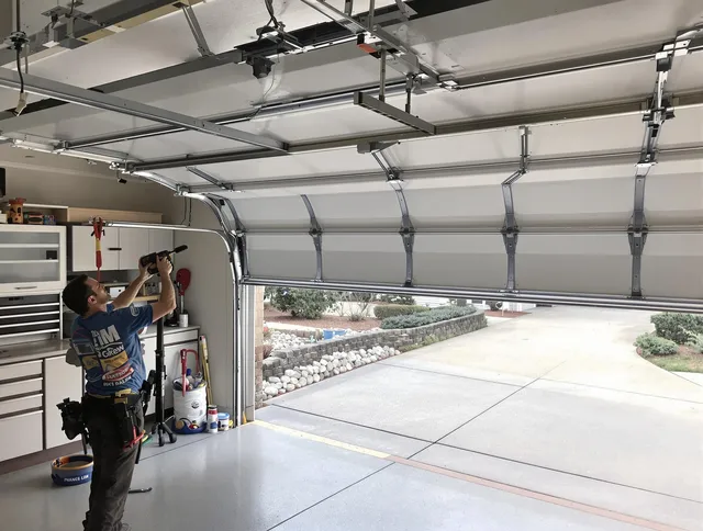 Garage door track repair service by Wilmington Garage Door Repair in Wilmington